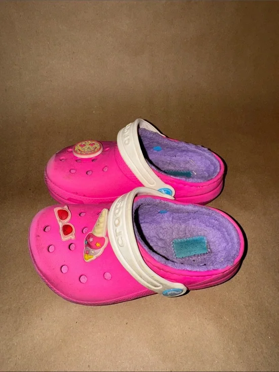 CROCS pink kids clogs with purple fleece lining and white straps
