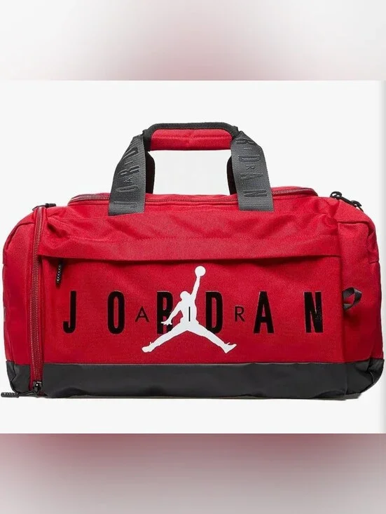 NWT Jordan Red Duffel Bag with White Jumpman and Black Accents.