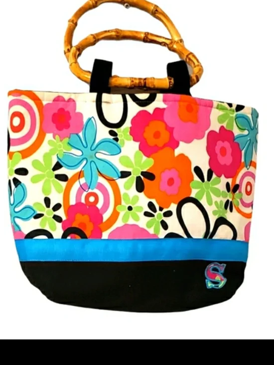 Thirty-One purse, which features a distinctive retro floral pattern. Med