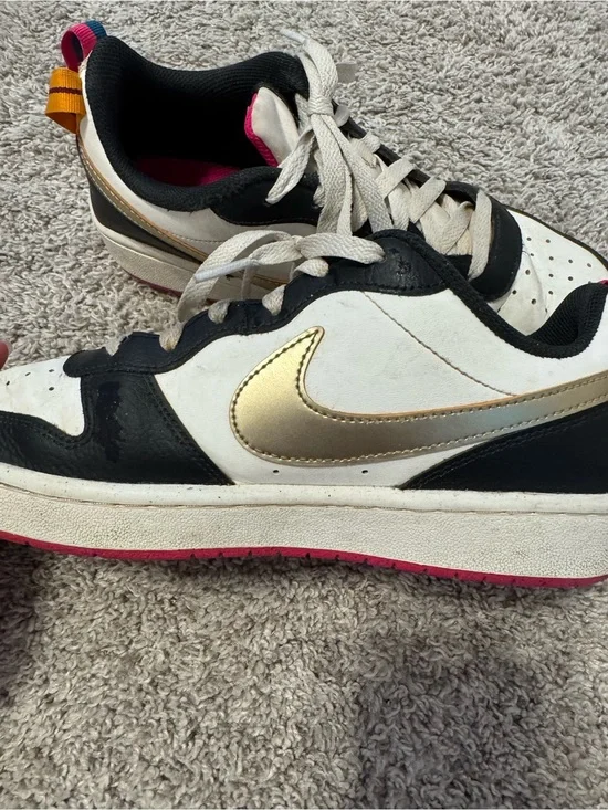 Nike Low-Top Sneakers in White, Black & Gold with Pink Accents