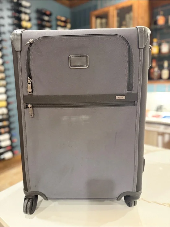 Like New Tumi Gray Upright Rolling Suitcase 26” check in with Front Zip Pockets