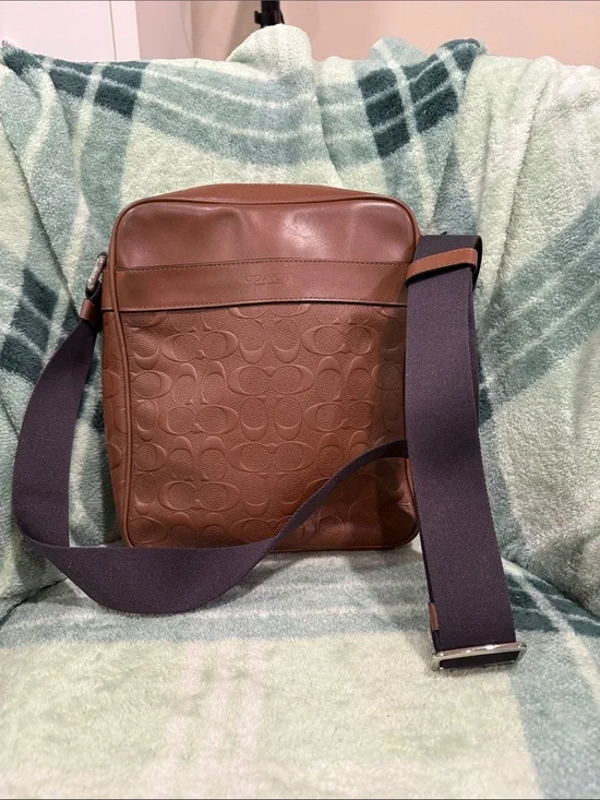 Coach Men’s Brown Embossed Signature Leather Messenger Bag with Navy Strap