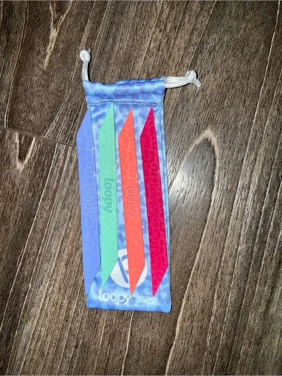 Loopy Case silicone strap set in blue, mint, coral, and magenta