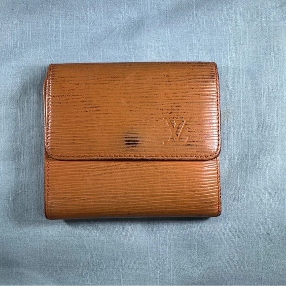 AUTHENTIC Louis Vuitton wallet. Tassel yellow.