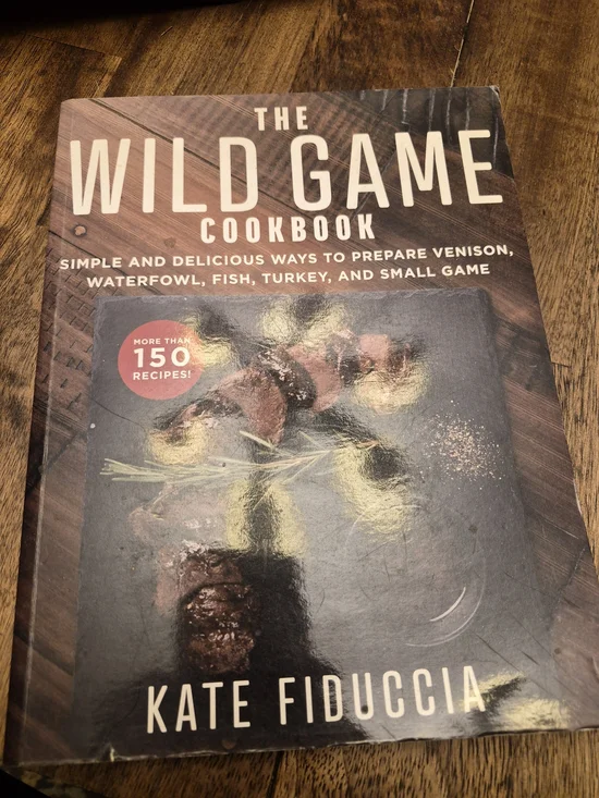 The Wild Game Cookbook by Kate Fiduccia - Brown & Black Cover