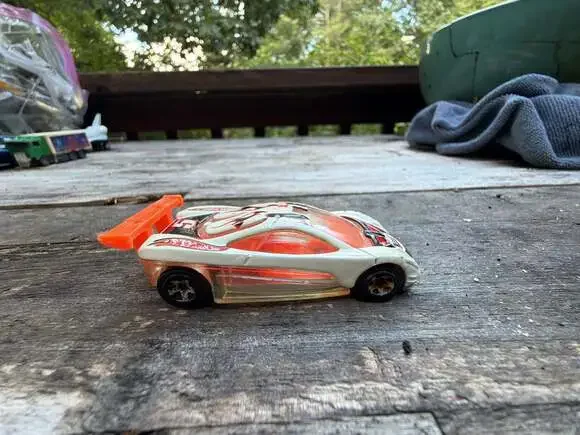 Hot Wheels HW Prototype 12 Diecast Toy Car White with Orange Interior