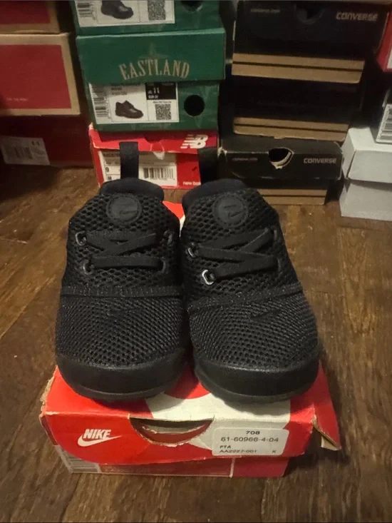 Nike Kids All-Black Mesh Lace-Up Sneakers