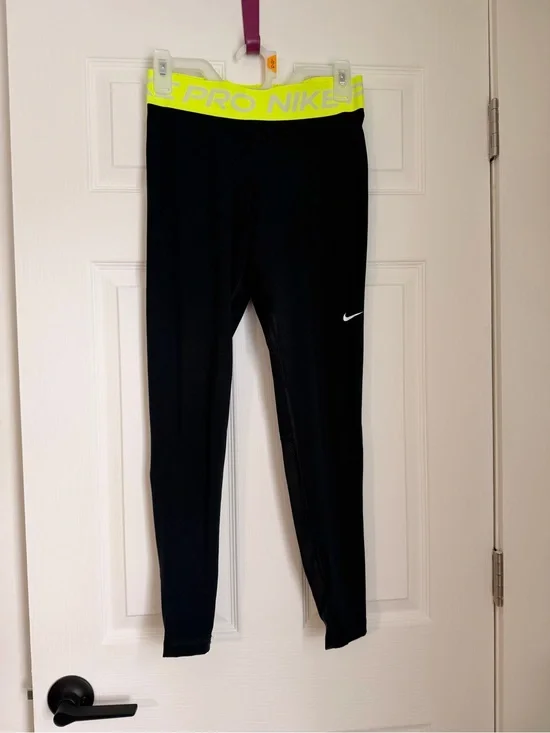 Nike Women’s Black Leggings with Neon Yellow 'PRO NIKE' Waistband