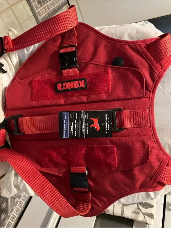 New. Kong tactical large dog or pet carrier.  XL size n pockets for poop bags