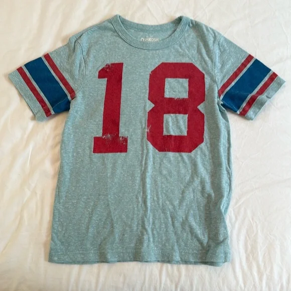 Size 8, Oshkosh T-shirt. Number 18.