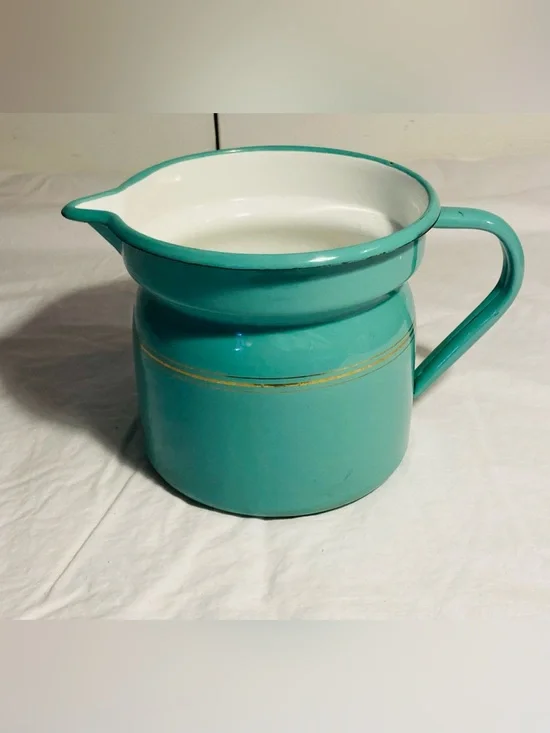 Vintage enamelware pitcher in pale aqua thin gold stripes white interior