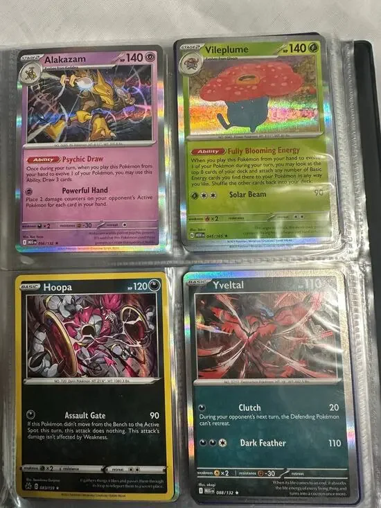 Lot of 80 holographic rare Pokemon cards.
