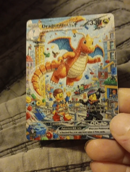 Pokemon Card with Orange Dragon and Blue Accents