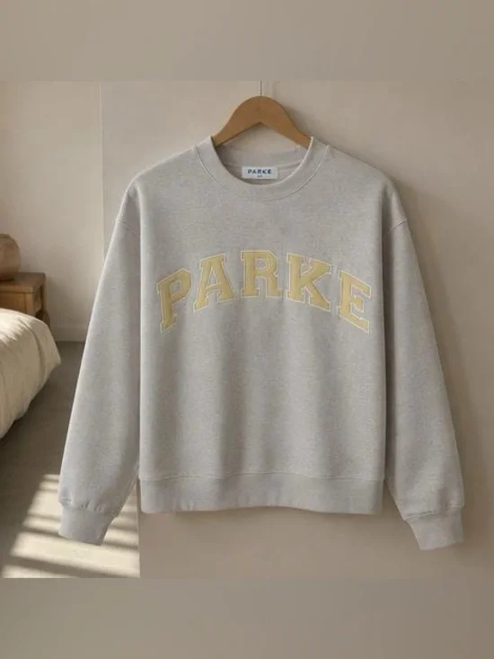 Parker Light Gray Crewneck Sweatshirt with Pale Yellow Appliqué
