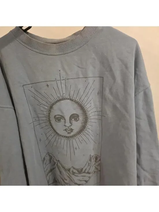 American Eagle Outfitters light blue crewneck sweatshirt with sun graphic size m