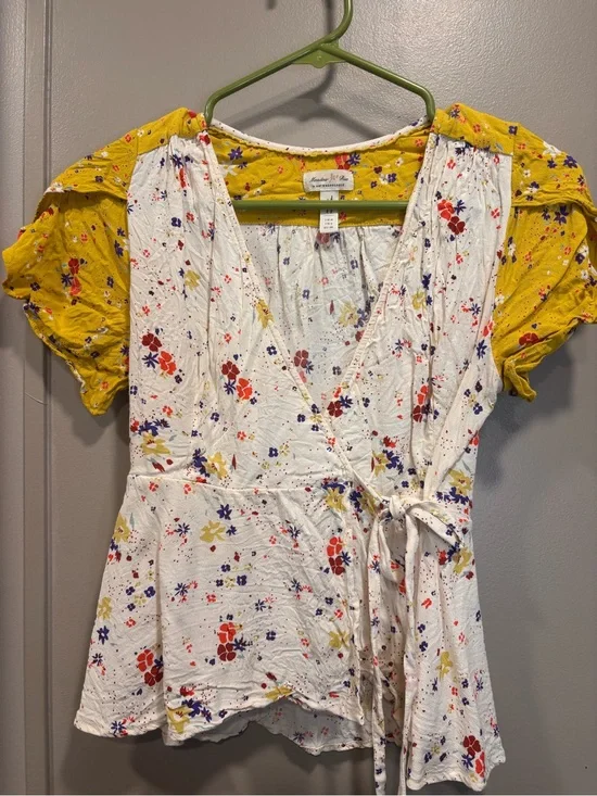 Anthropologie White Floral Wrap Top with Mustard Puff Sleeves