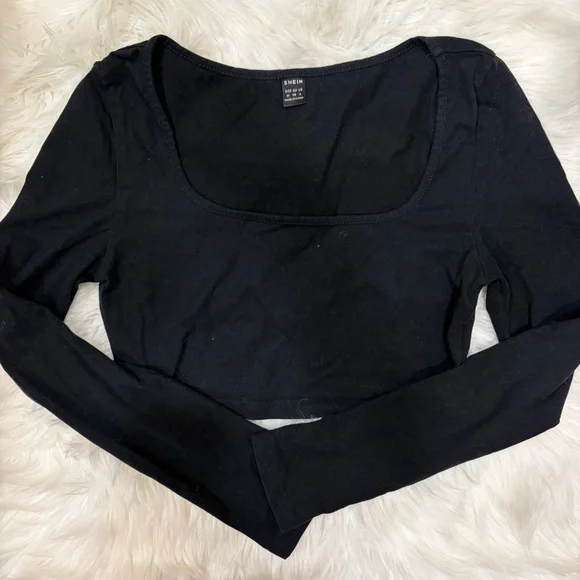 Black cropped long sleeve top