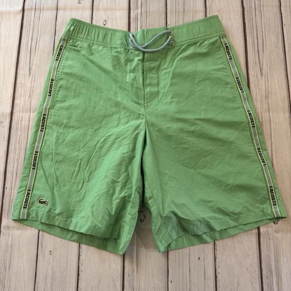 LACOSTE Size 3 Seafoam Green Swim Trunks w/ Spell Out Sides‎ and Logo