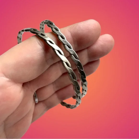 Pair of vintage unmarked sterling? flat twist link Mexico bangle bracelets