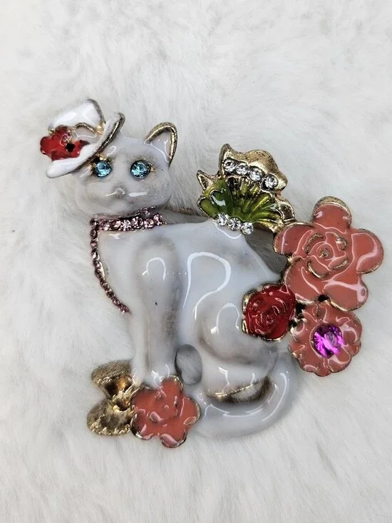 Decorative White Cat Brooch with Pink and Red Floral Accents