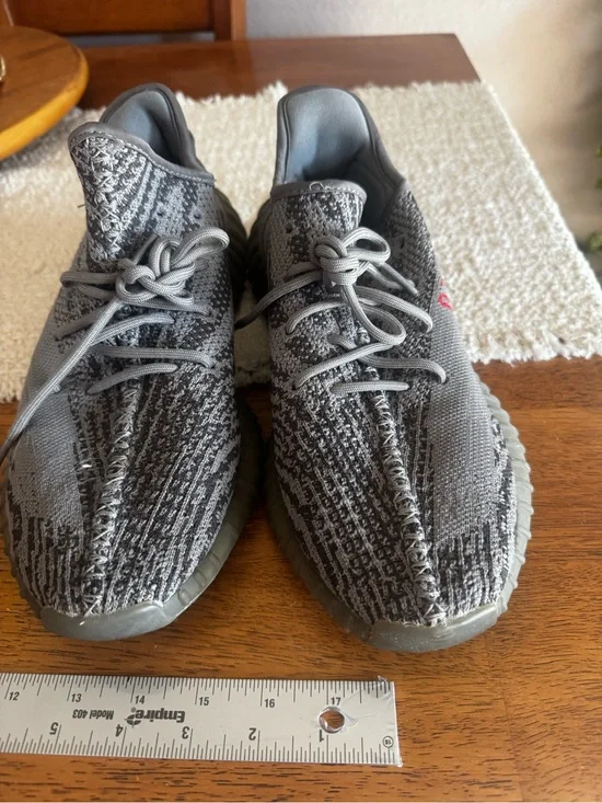 Yeezy Gray Knit Low-Top Sneakers ywith Subtle Pattern and Olive-Toned Sole