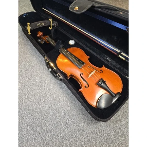 A Deatherage Violin 4/4 used (made by the Deatherage Mfg. Company in TX.)