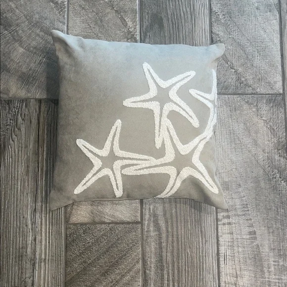 Tan Pillow with White Starfish Design 17”x 17”.