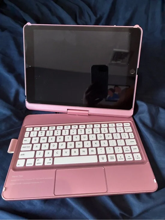 Pink Ipad with Keyboard Case included - no chargers.