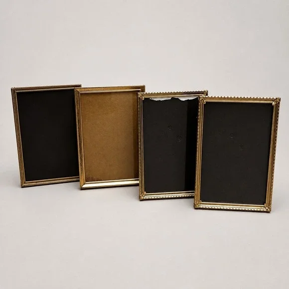 Vintage Gold Metal Picture Frames Set of 4 Ornate Embossed 5x7 Tabletop Decor