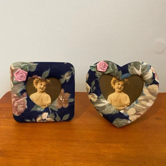 Two small fabric covered picture frames