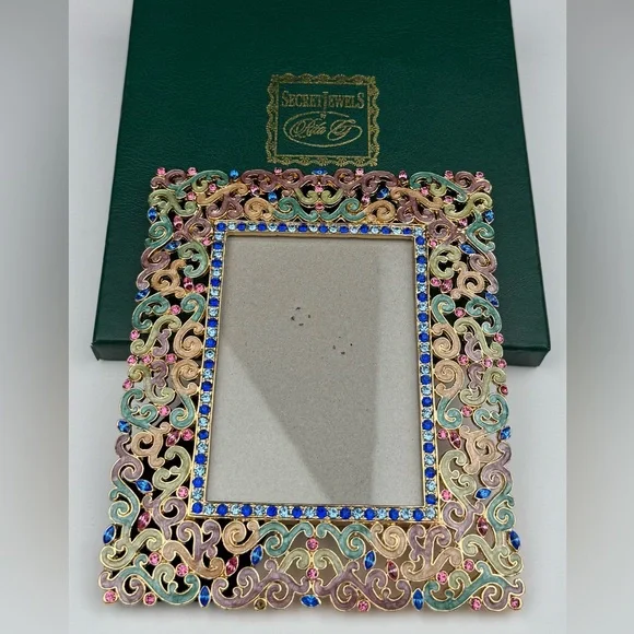 Secret Jewels by Rita G ornate frame.  New in  box. Measures 5” (W) X 6” (L).
