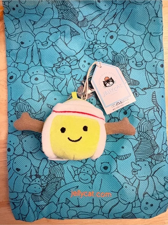 Jellycat Plush Tennis Ball Keychain in Yellow and White with Brown Arms