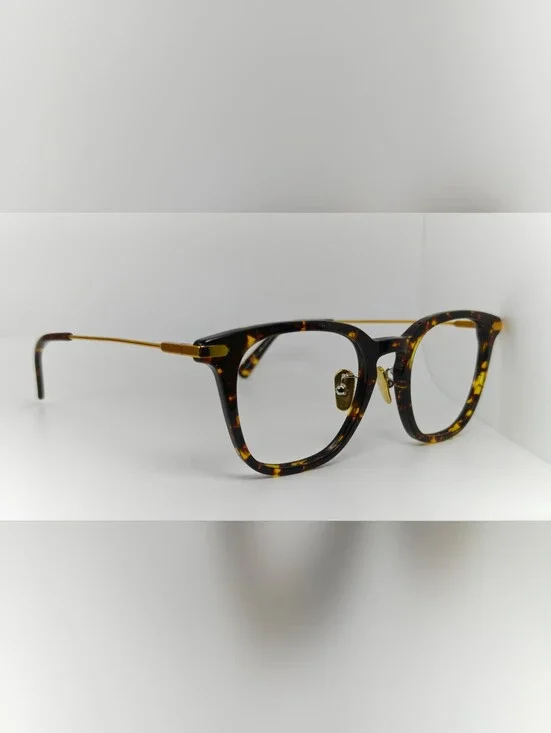 Hayes. Tortoise Shell Round Frame Glasses with Gold Temples.