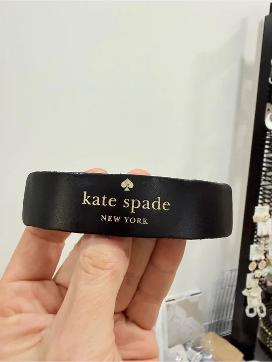 kate spade Black Leather hair clip with Gold Logo Detail