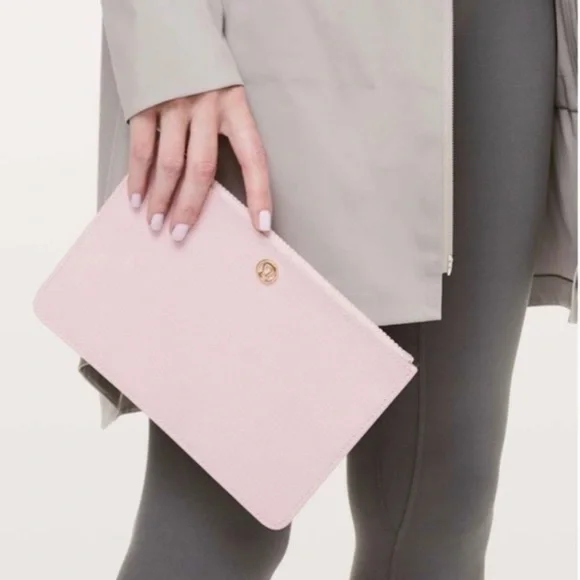 Lululemon Pink Clutch Wristlet Gold Logo Minimalist Goody Bag New with tags