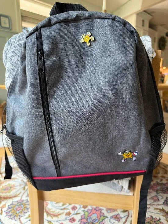 Grey Hit Promotional Backpack with Retro Basketball Character & Enamel Pin