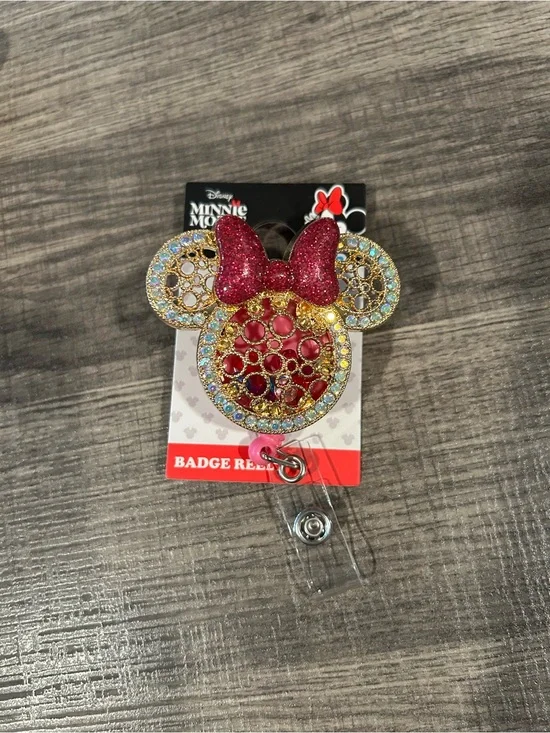 Disney Minnie Mouse Gold-Tone Badge Reel with Red Glitter Bow