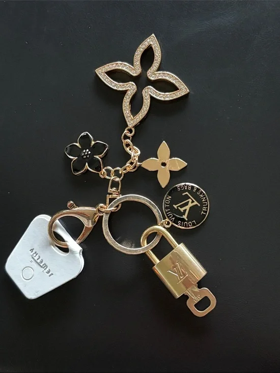 LV lock and button charm with keychain