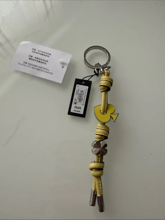 kate spade Yellow Leather Knot Tassel Key & Card Holder with Clover Accent