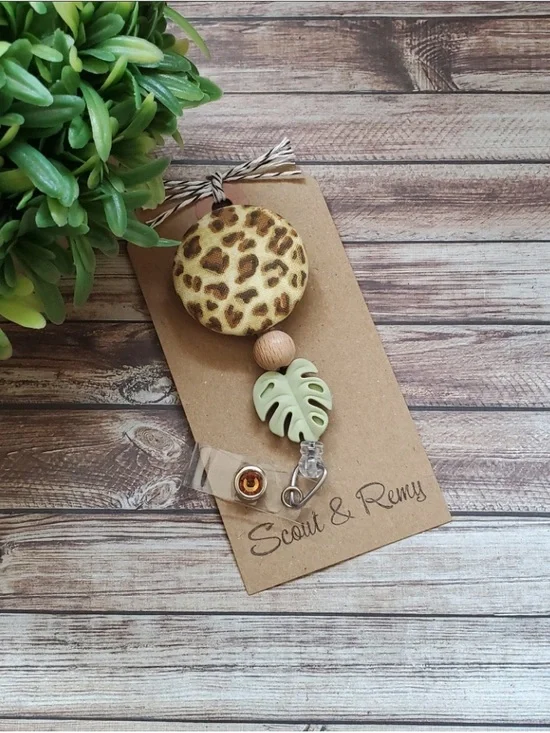 Leopard Print Badge Reel with Green Leaf Charm