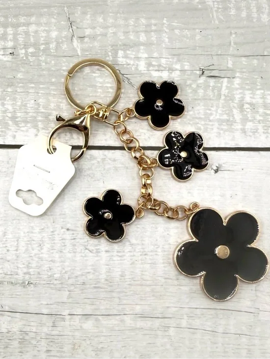 NEW keychain or purse charm. Gold and black.
