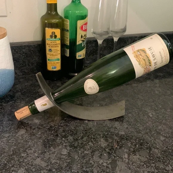 Handcrafted floating Curved Single Wine Bottle Metal Display Stand