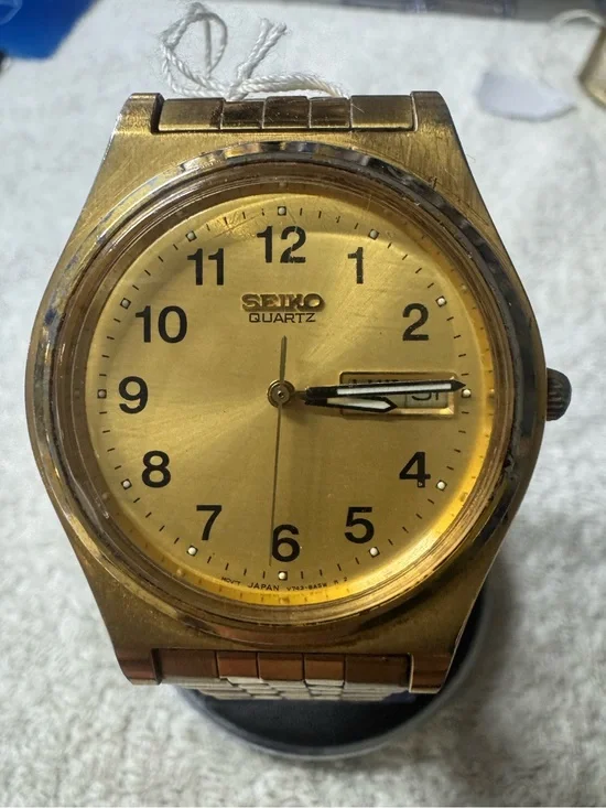 Seiko Gold Tone Quartz Watch with Black Numerals