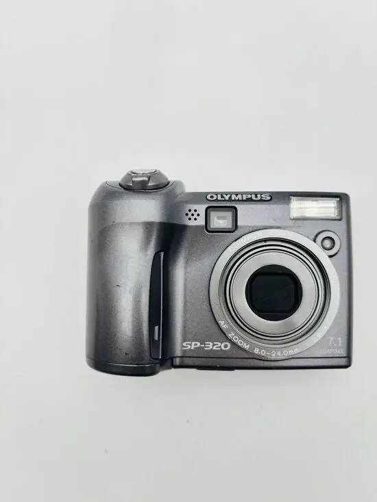 Olympus SP-320 7.1MP Digital Camera Compact 2.5″ Screen 3x Optical Zoom Works