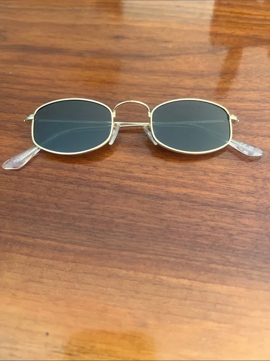 Meller Suku Sunglasses in Gold Olive