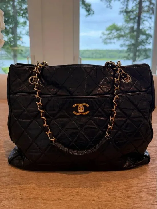 CHANEL Black Quilted Leather Shoulder Tote with Gold Chain Hardware