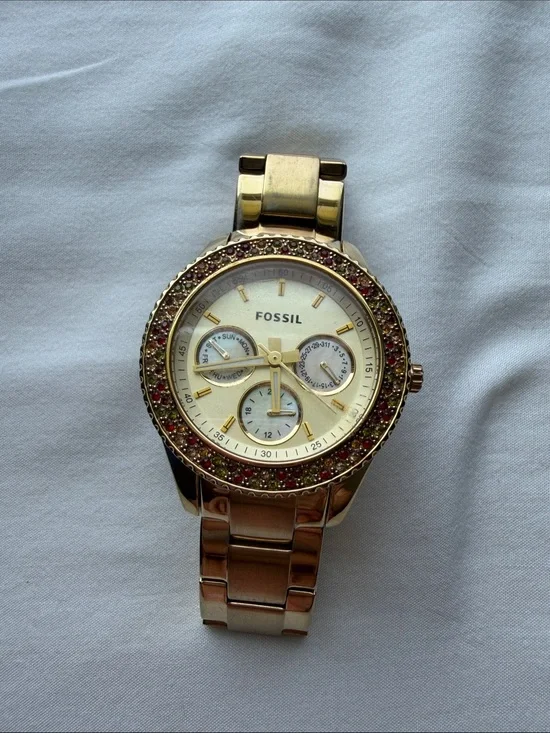 Fossil Women’s Gold-Tone Multi-Function Crystal Bezel Watch
