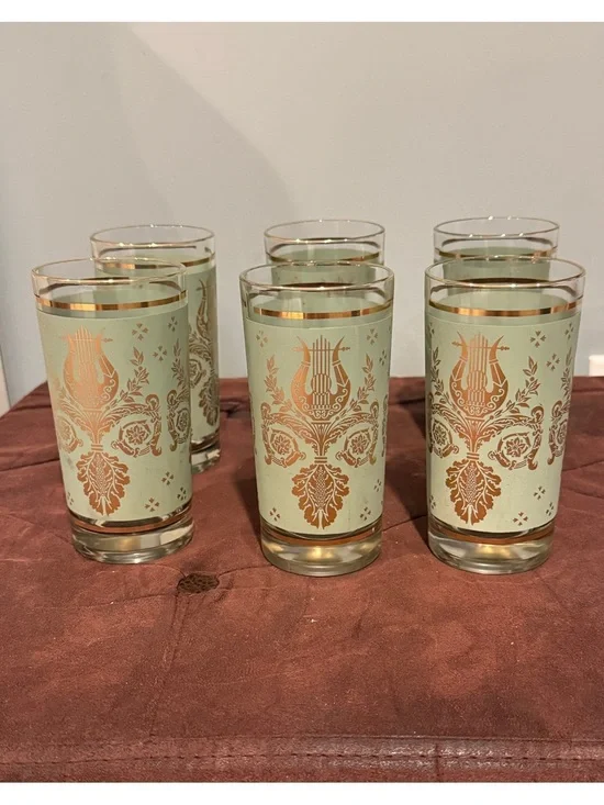 Set of 6 glasses vintage green and gold design. Holds 8 ounces