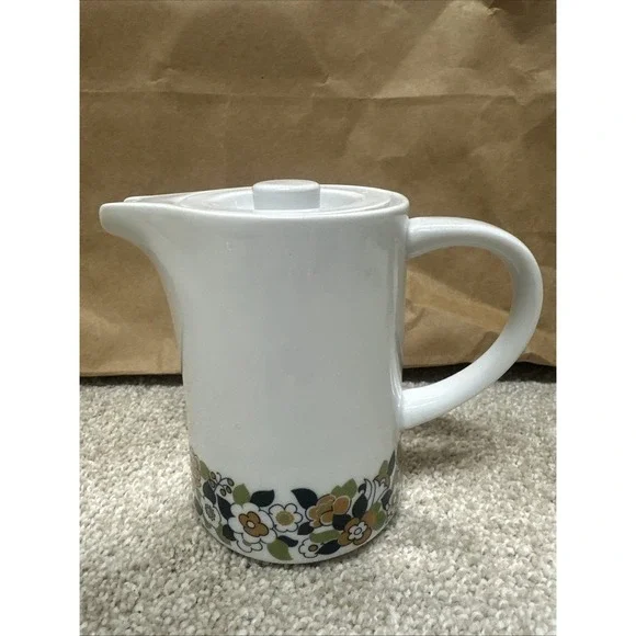 Vintage cream pitcher in the retro floral, manufactured by Suisse Langenthal