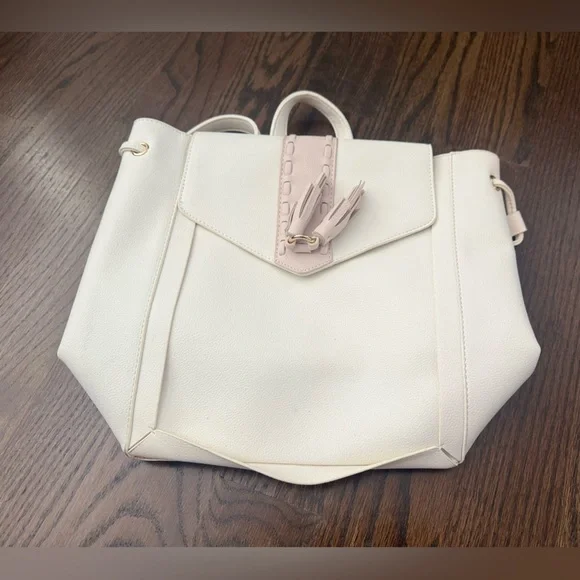 Chic Cream Backpack with Tassel Accent